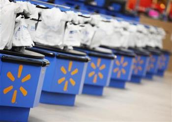 The Wal-Mart logo is pictured on cash registers at a new store in Chicago